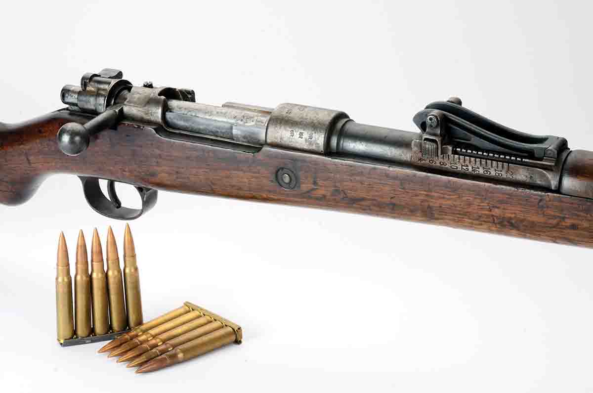 This is a German Gewehr 98 as used in World War I, one of the very first military versions of Mauser Model 1898s. The cartridge was 8x57mm.